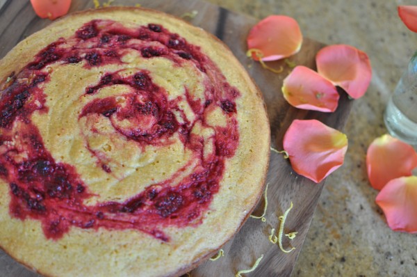 Citrussy polenta cake with raspberry swirl