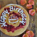 Citrussy polenta cake with raspberry swirl