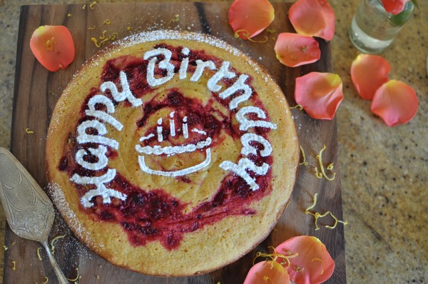 Citrussy polenta cake with raspberry swirl