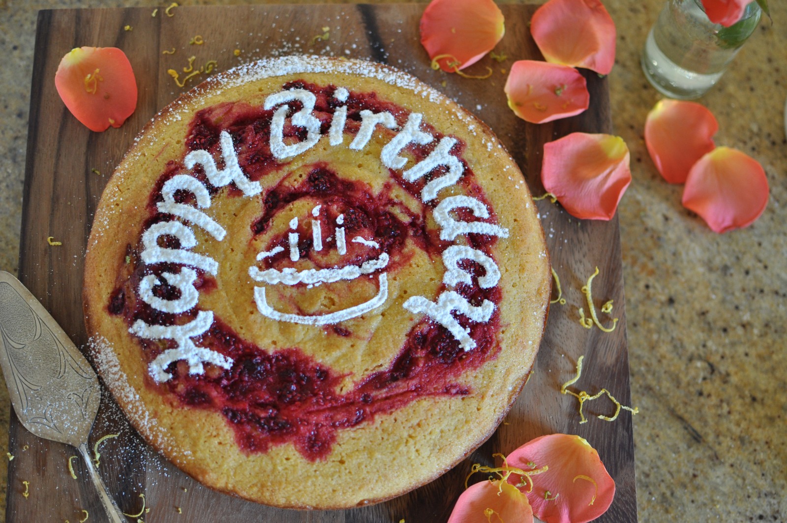Citrussy polenta cake with raspberry swirl