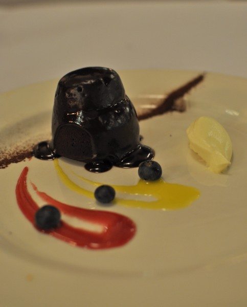 fondente al cioccolato ($17) - soft centred chocolate fondant with mascarpone cream, fresh blueberries and an redcurrant sauce