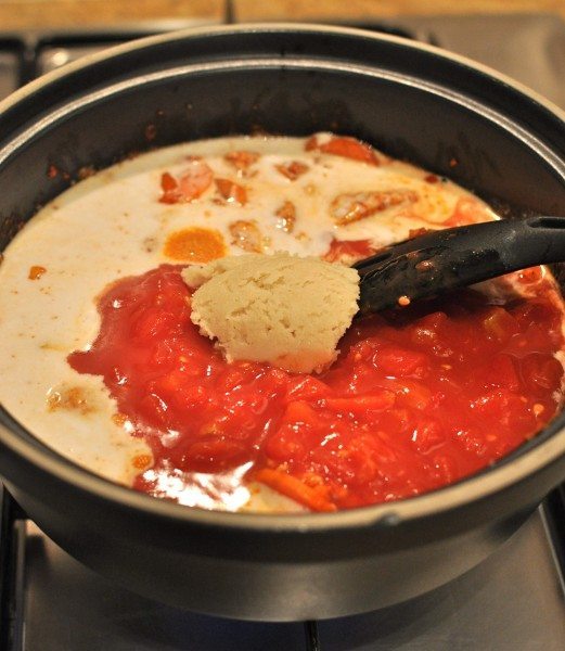 Coconut milk, tomatoes and macadamia butter