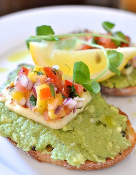 Seasoned avocado on sourdough toast, grilled la vera halloumi, mango, basil and tomato salsa, pink lake salt, maleny avocado oil $13