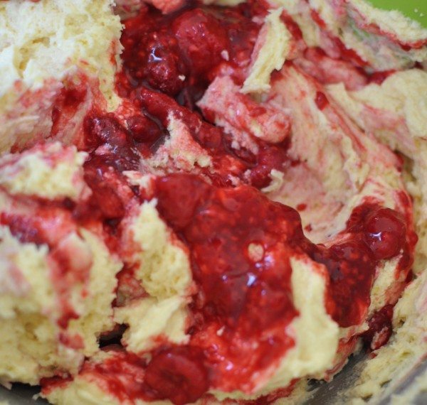 Cupcake batter with raspberries