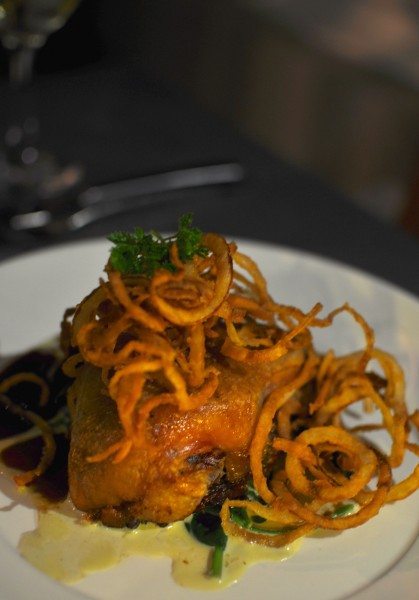 Crispy roasted duck, garlic spinach, orange & thyme jus, crispy onion rings $36