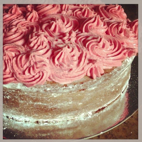Raspberry yoghurt cake with floral icing