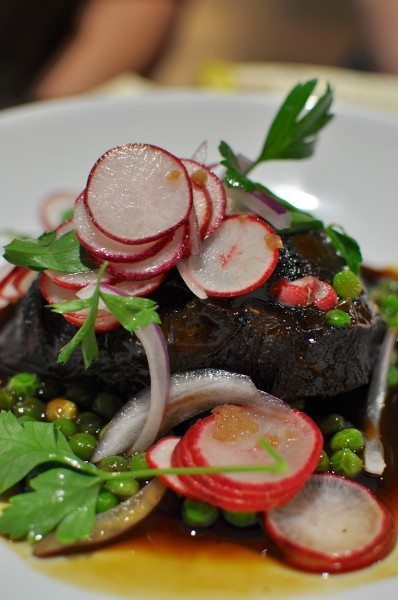 Mejillas de carne - beef cheeks braised in pedro ximénez, green pea and radish salad