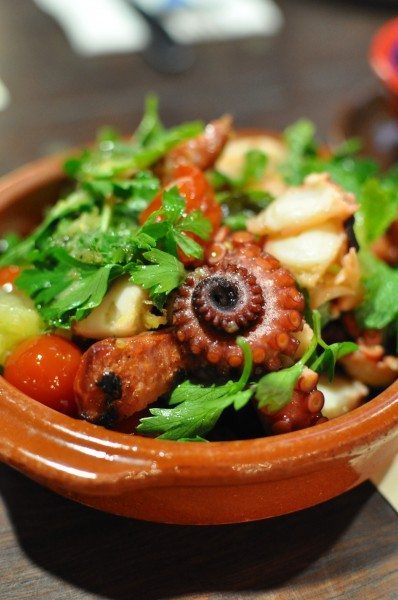 Pulpo con chorizo - grilled octopus, chorizo, fresh lime, parsley & tomato