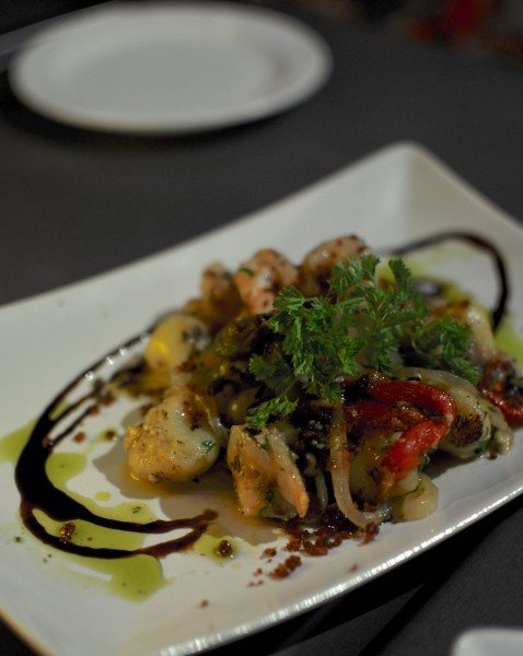 Seared gnocchi, prawns, chili, confit garlic, peppers, basil oil and chorizo crumb $24